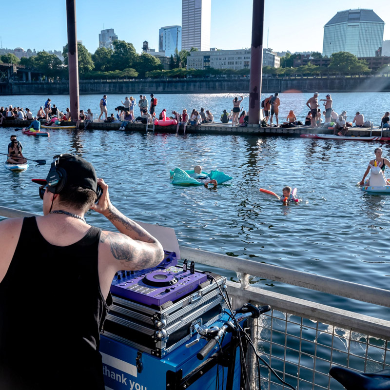 DJ spinning tunes at the Duckworth Summer Wednesday community event in the Lloyd District in Portland, Oregon
