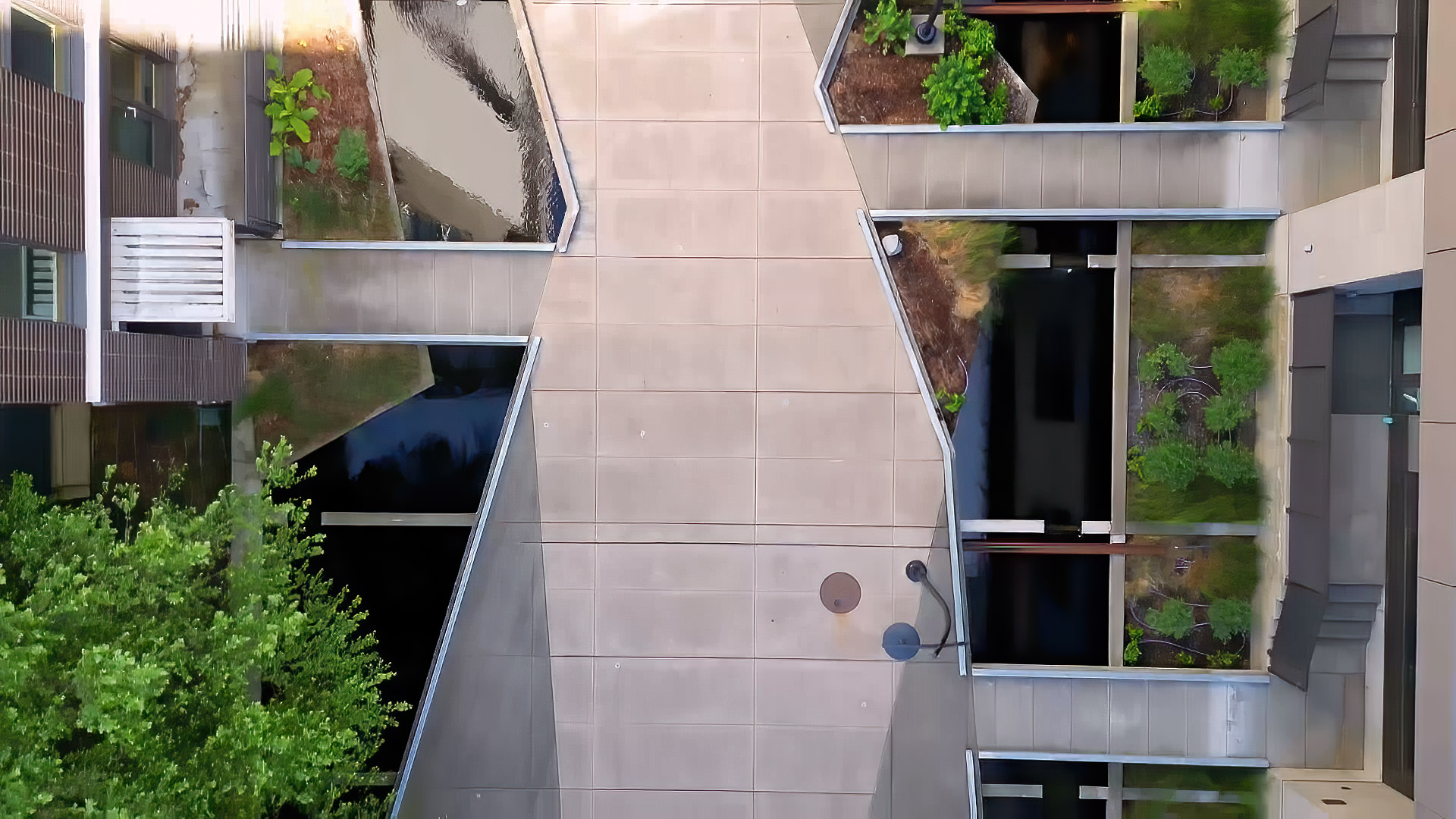 Courtyard with koi ponds at Hassalo on Eighth community in Portland